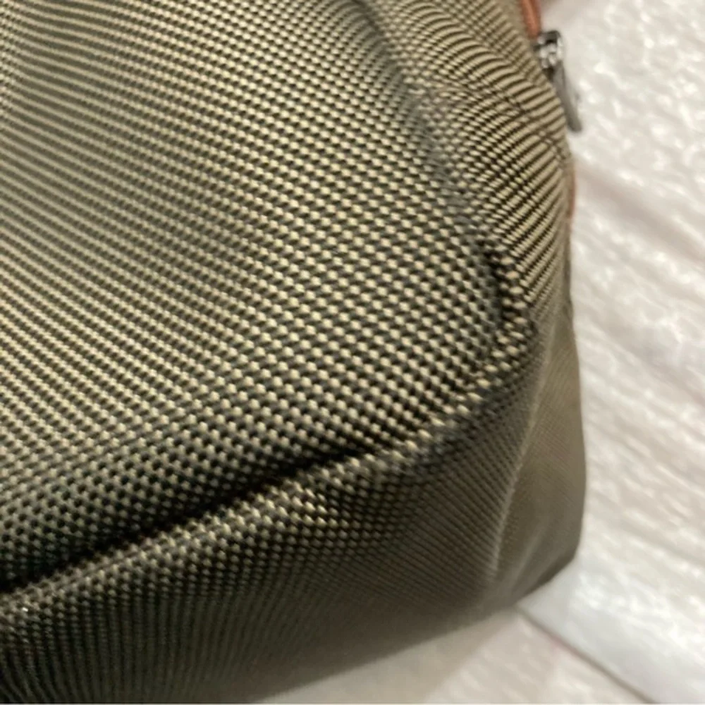 Longchamp canvas and leather duffle travel bag unisex